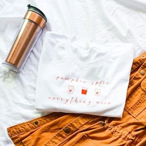 White tee with orange lettering.